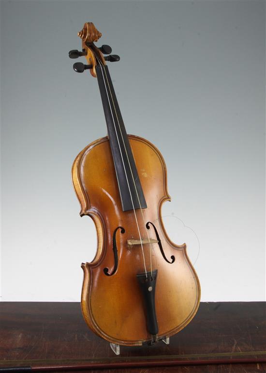 A late 19th / early 20th violin, length of back 14in., together with case and bow